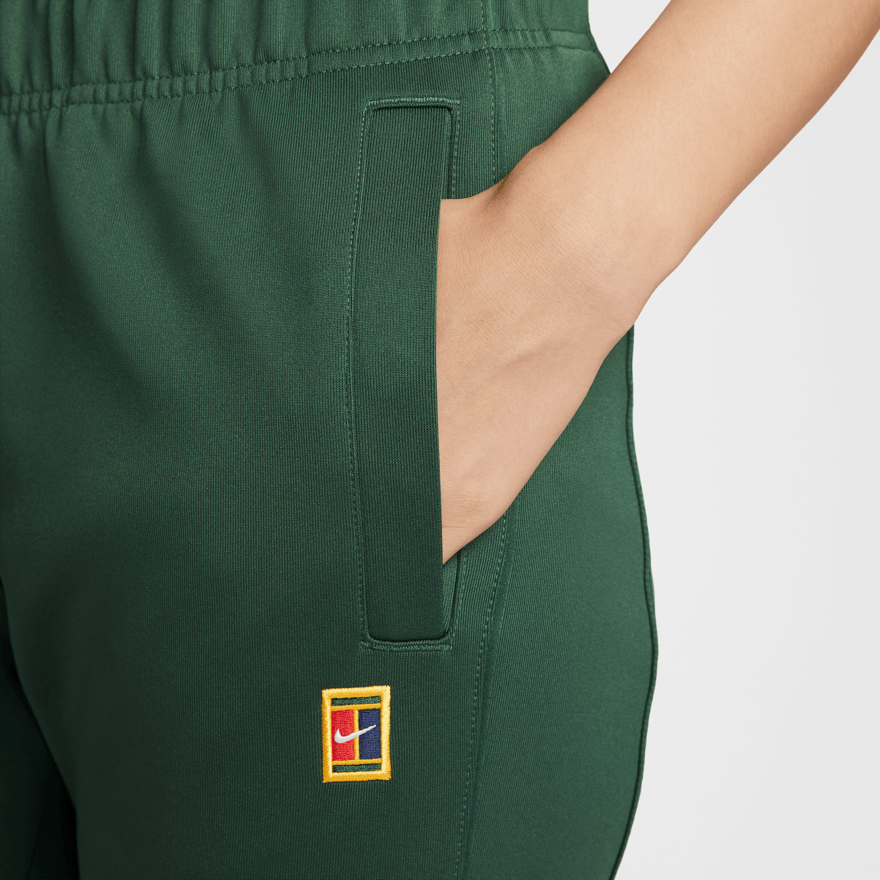NIKECOURT HERITAGE WINDRUNNER WOMEN'S MID-RISE TENNIS PANTS