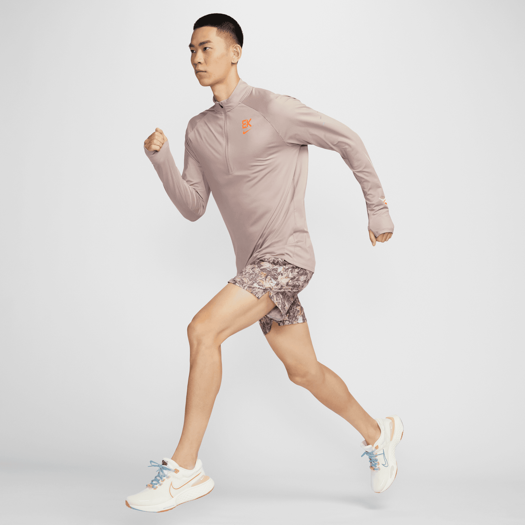 NIKE STRIDE "ELIUD KIPCHOGE" MEN'S DRI-FIT 1/4-ZIP RUNNING TOP