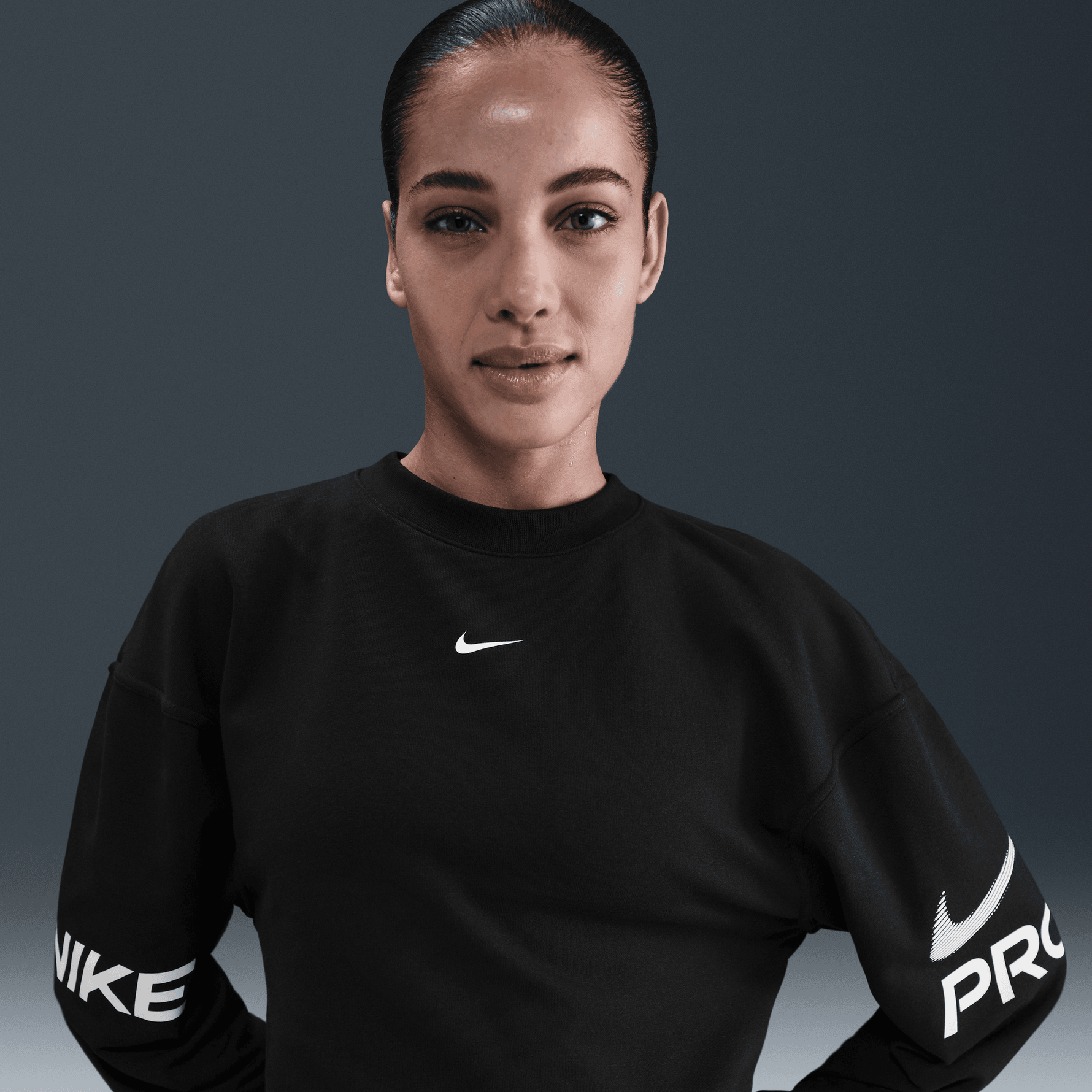 NIKE PRO WOMEN'S DRI-FIT LOOSE CREW-NECK FRENCH TERRY SWEATSHIRT